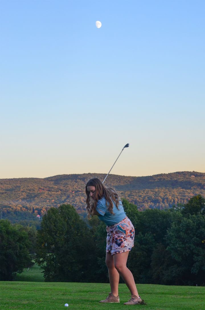 Photo of Avalon Green swinging a golf club